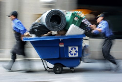 Different types of business waste being sorted for removal